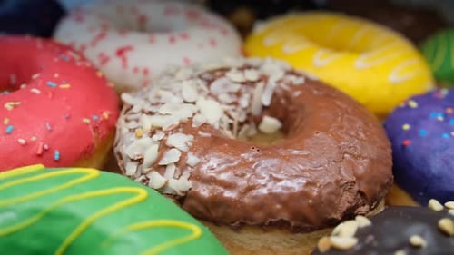 Colorful Doughnuts With Chocolate, Sprinkles, and Bright Icing