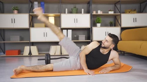 Man I exercise at home. Sport.