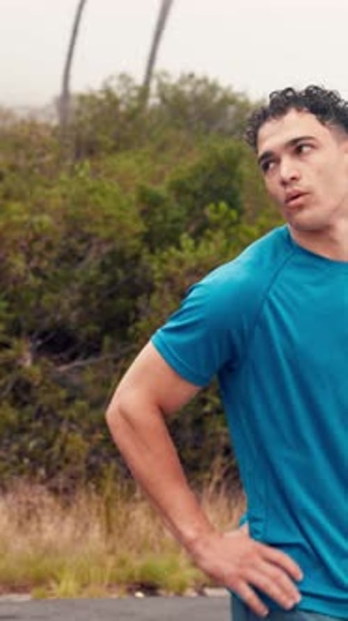 Running, fitness and back of men on mountain for exercise, cardio workout