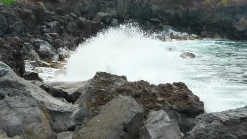 Waves Crashing on Rocky Shoreline