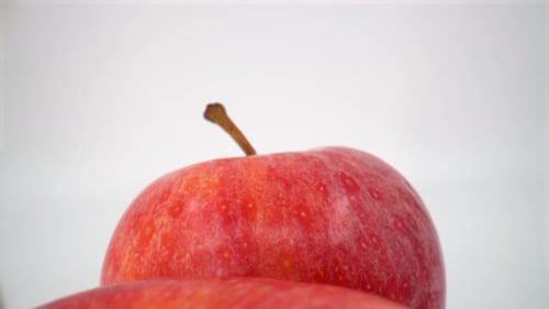 Red apple close up on white background isolated 4K
