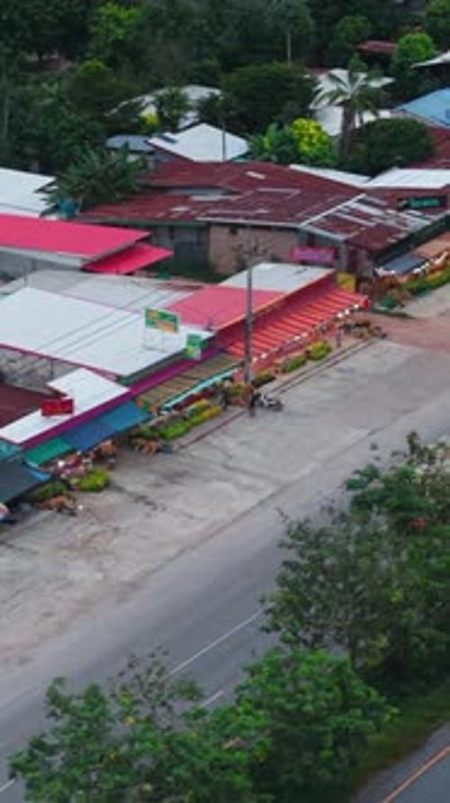 Shops in a Market Kluai Khai Next to a Highway in Rural Thailand