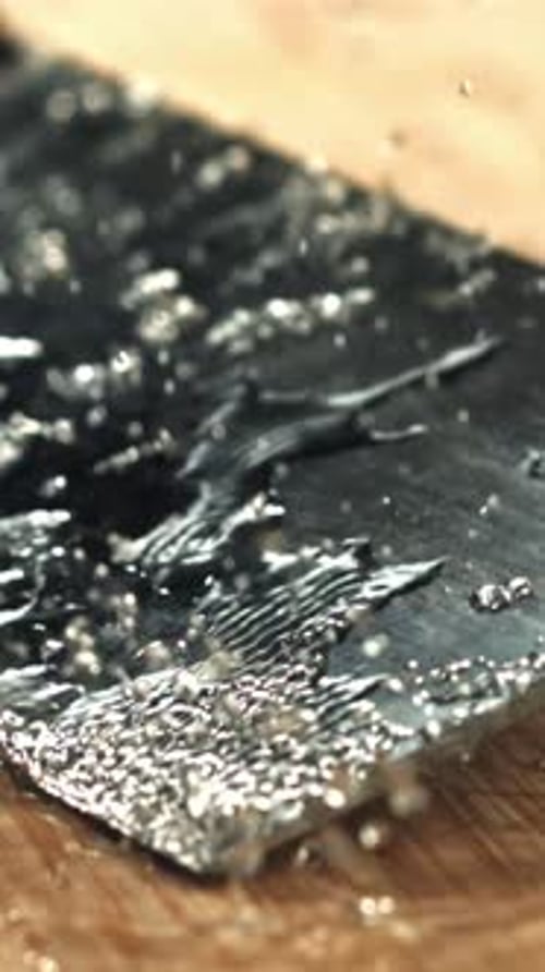 The Butcher Knife Falls on the Cutting Board Filmed on a Highspeed Camera at 1000 Fps