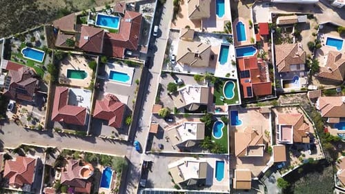 Aerial View of Stunning Suburban Houses with Pools
