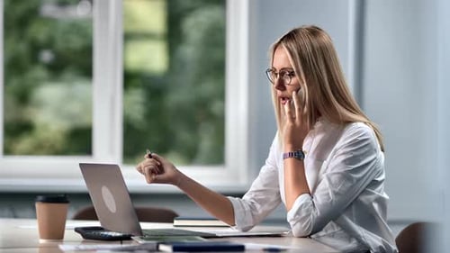 Blonde Business Woman Boss Employee Working Laptop Talking Smartphone at Modern Office Workplace