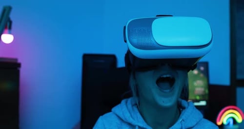 Girl Gamer Playing At Virtual Reality Game Online Using Vr Headset