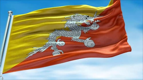 Bhutan National Flag Waving Loop against Blue Sky