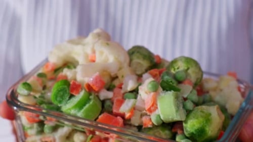 Frozen Vegetables in Clear Glass Container Close Up