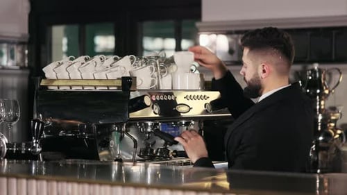 Barista Making Coffee in Professional Espresso Machine
