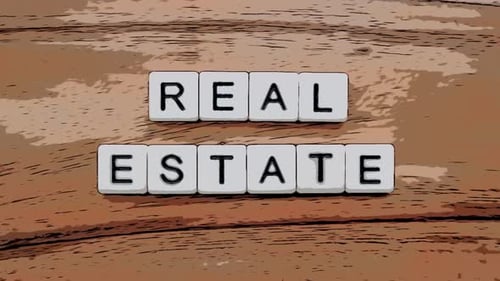 Real Estate Spelled Out with Letter Tiles