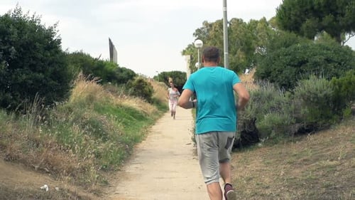 Youthful runners enjoy an energetic workout in the park slow motion 240fps