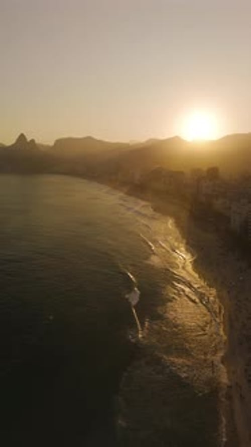 Drone Ascending Ipanema Beach Golden Sunset Reflections