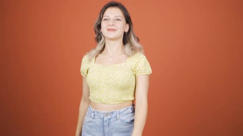 Woman Dancing Joyfully in Studio
