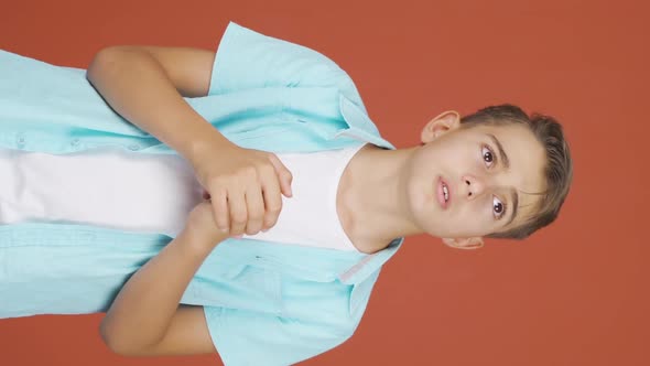 Vertical video of Hesitant boy., People Stock Footage ft. facebook ...