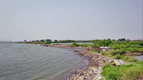 Baruna beach located in North Semarang, Central Java, Indonesia_tilt up shot