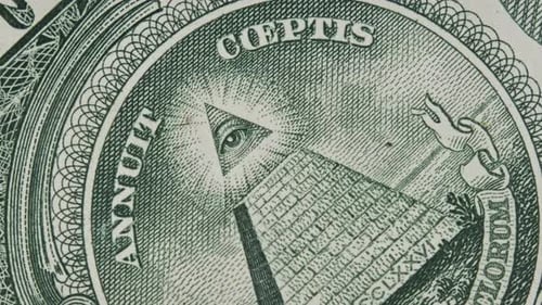 The AllSeeing Eye Sign Rotates on a One Dollar Bill CloseUp