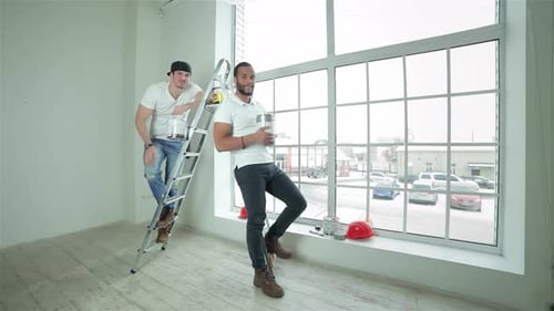 Young Men Working on Home Renovation Project