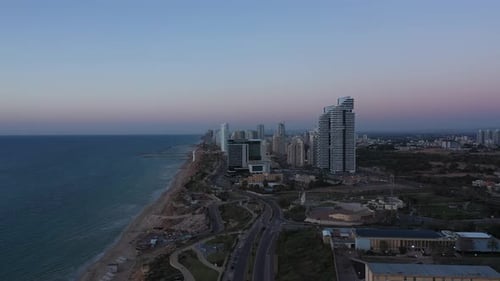 Aerial view of the city of Netanya and its coastline - part of the Israeli coastal plain, at sunset