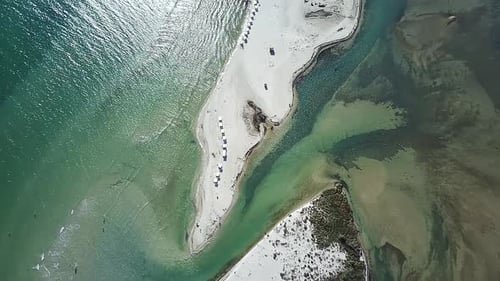 Sandy Spit Surrounded By Turquoise Waters.