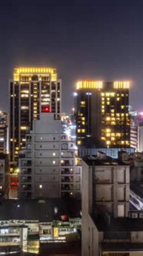 Vertical time Lapse of Kaohsiung Taiwan at night.