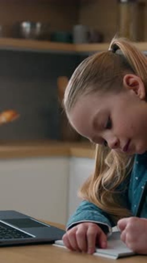 Home Schooling Quarantine Elearning at Home Kitchen Concept Caucasian Kid Child School Girl Daughter