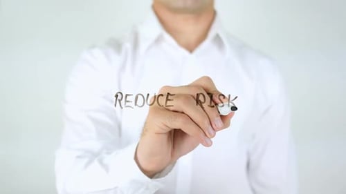 Reduce Risk, Man Writing on Glass