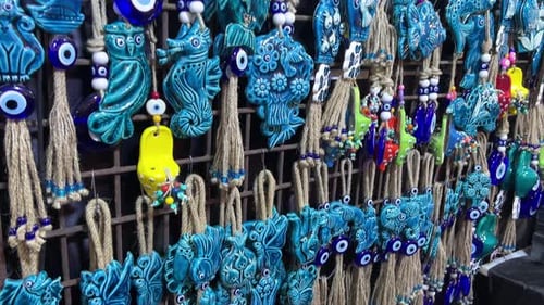 View of Turkish evil eye earrings in display at a store.