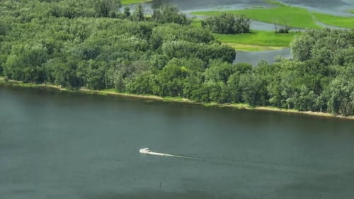 Speedboat Cruising In The Mississippi River Along The Great River Bluffs State Park In Minnesota, US