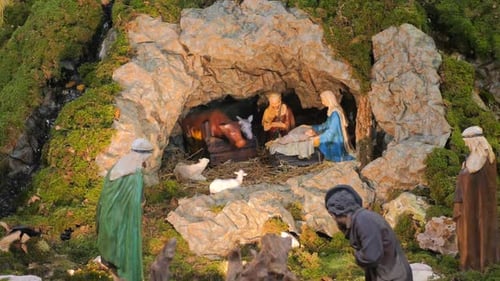 Nativity Scene Inside Roman Catholic Church - Art Objects Representing The Birth of Jesus In A Barn.