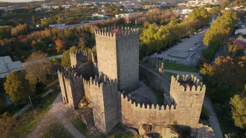 Slow far to close up drone shot of the Guimaraes Castle