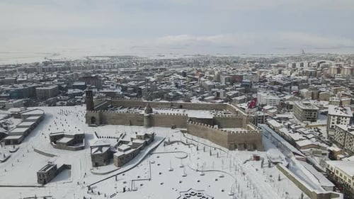 Aerial View of Snow Covered Castle and Cityscape