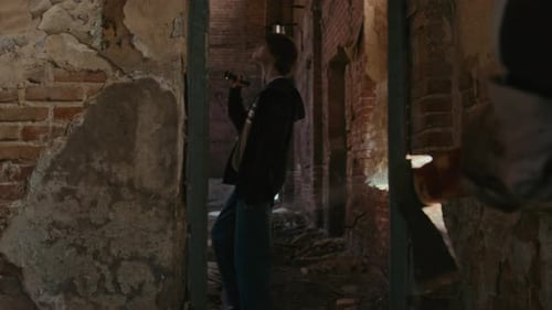 Crazy Clown with Axe Running after Female Wanderer in Creepy Place