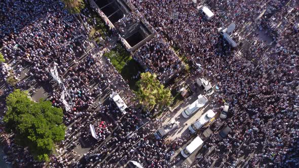 Aerial top down: Crowd of Argentinian People celebrating win of Soccer ...