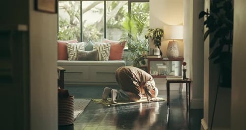 Muslim, religion and man bow in prayer on mat for spiritual worship, holy meditation and gratitude