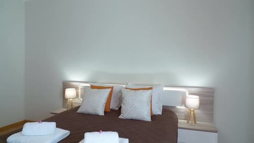 Clean Bedroom Interior with Bed and Soft Lighting