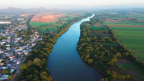 Santiago River Meanders Through A Lush Green Valley In Santiago Ixcuintla, Nayarit. Mexico