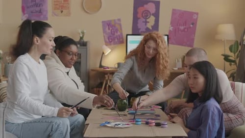 Club of Diverse Feminists Gathering Together in Apartment