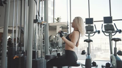 Gym workout focusing on strength training in slow motion