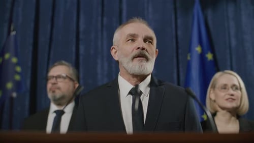 Senior Politician Delivering Speech at European Union Press Briefing
