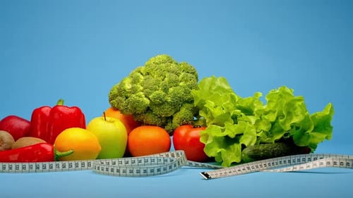 Fresh Fruits and Vegetables with Measuring Tape