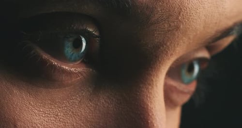 Sad, depression and blue eyes of woman after crying, anxiety and stress while looking scared