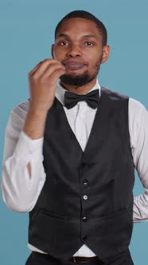 Vertical Video Lounge Area Employee Explaining Luxury Amenities to Guests at Five Star Resort