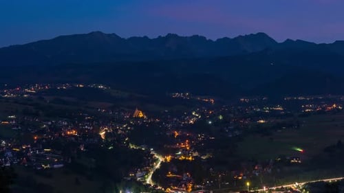 Summer Dusk City Lights of Zakopane with Tatra Mountain Backdrop