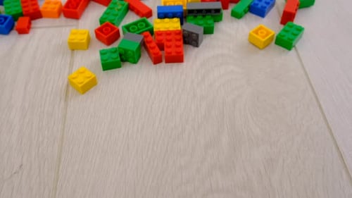 Colorful Building Blocks on Light Wood Surface
