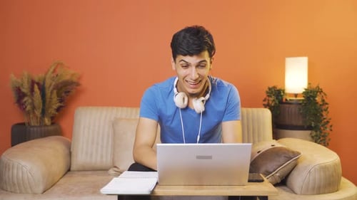 Young Adult on Video Conference Call at Home