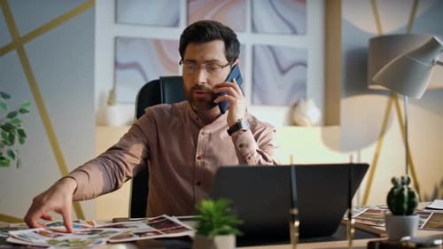 Confident Company Worker Calling Discussing Work Project in Modern Office. Bearded Businessman