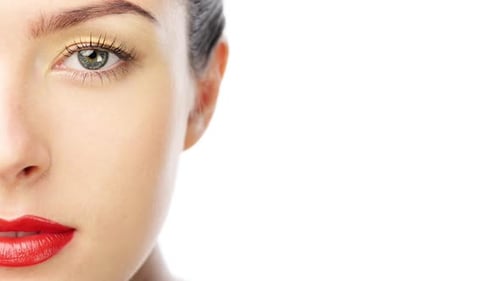 4k video footage of a beautiful young woman against a white studio background