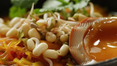 Delicious Noodle Dish with Fresh Fish and Greens