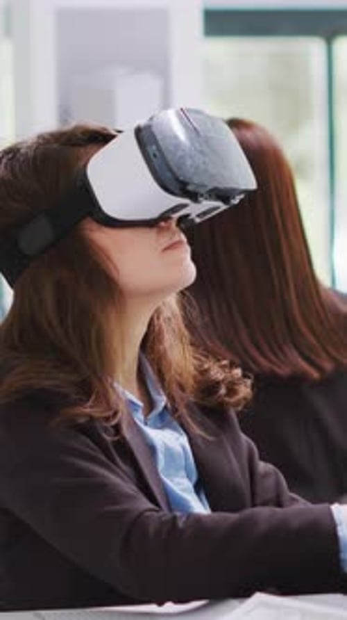 Vertical Video Architect Designing Project Blueprints and Plans with Vr Headset