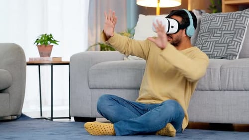 Young Adult Using Virtual Reality Headset at Home